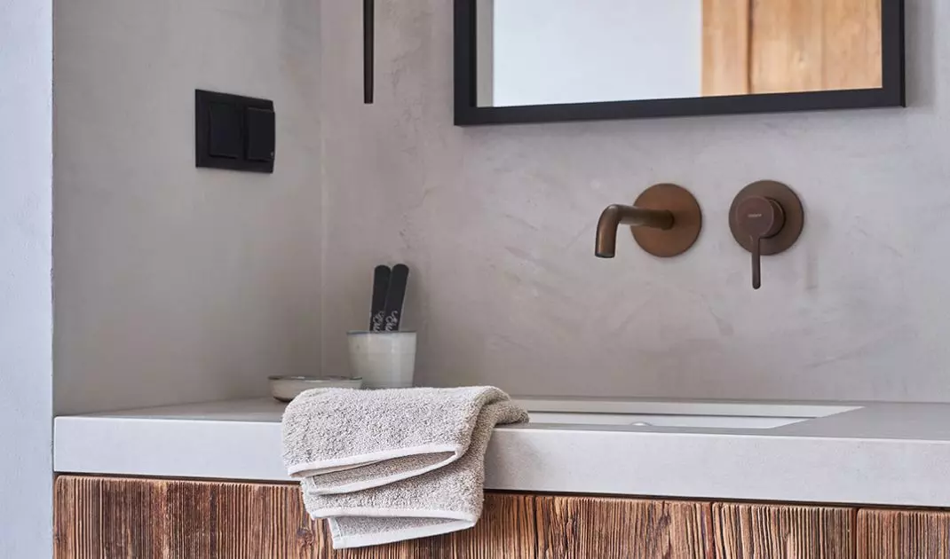 The chest of drawers was created from recycled wood