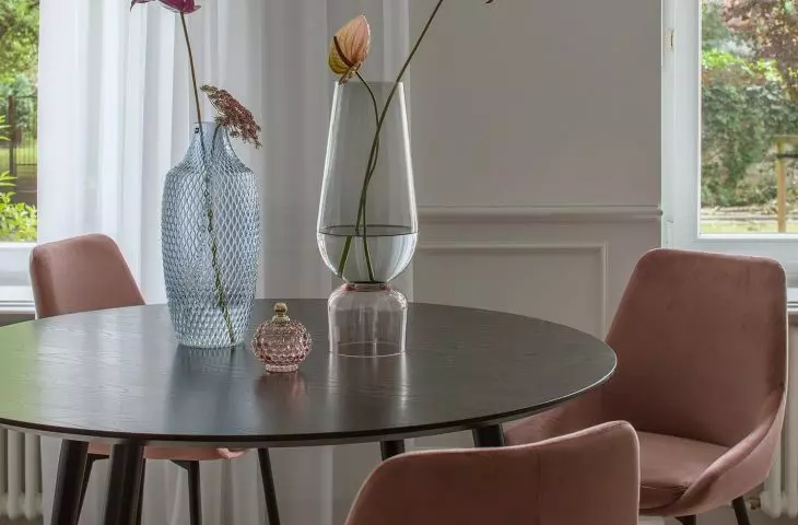 The table has been tailored specifically to fit the volume of the room
