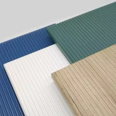 Fluted fronts have a decorative pattern of grooves, usually in the form of geometric or organic patterns.