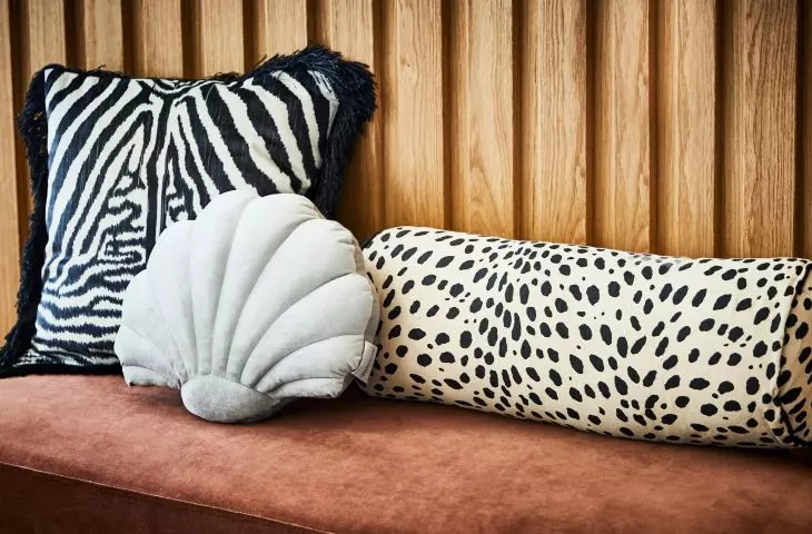 Introduce bold patterns with textiles