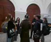 The discussion after the lecture moved to the corridor 