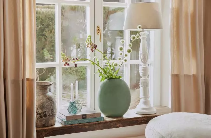 Plants will give the arrangement a natural feel