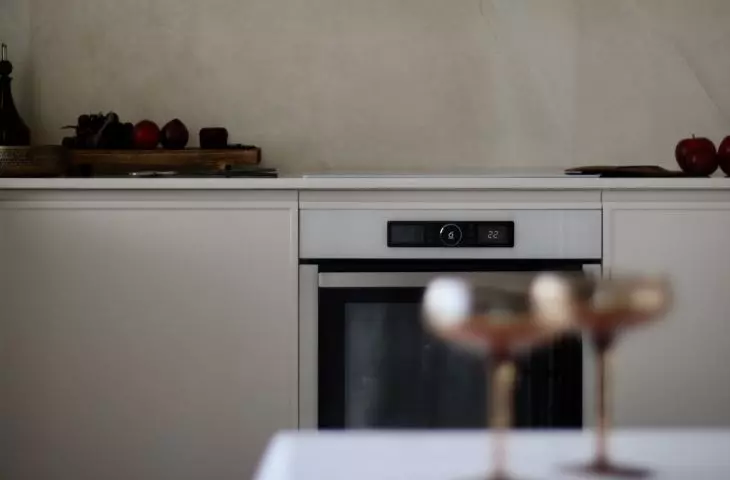 A simple built-in hides all the necessary kitchen equipment