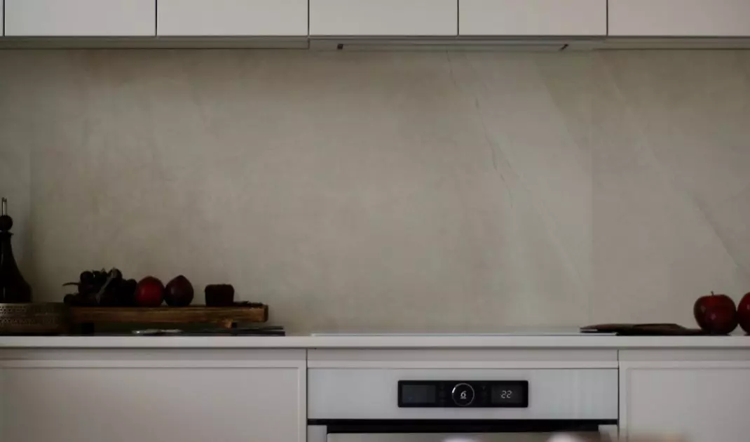 A simple built-in hides all the necessary kitchen equipment