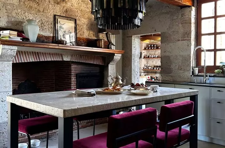 There is no shortage of bold accents such as ruby seat upholstery