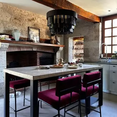 There is no shortage of bold accents such as ruby seat upholstery