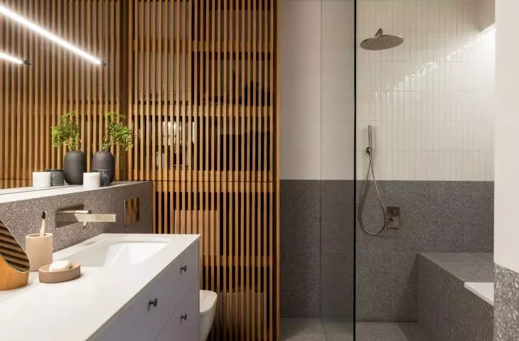 Bathroom arrangement is more subdued