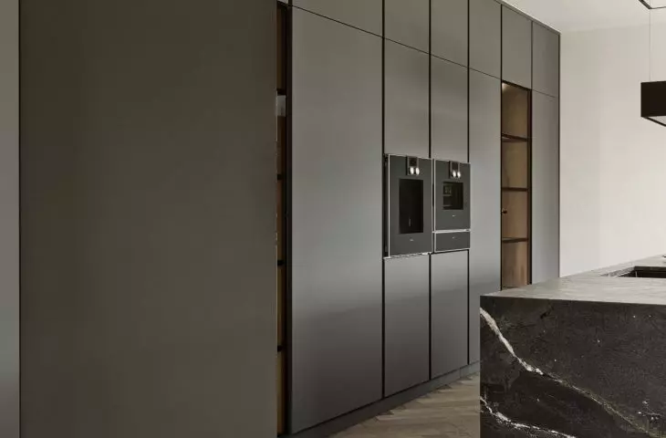 The door to the pantry has been hidden in the built-ins