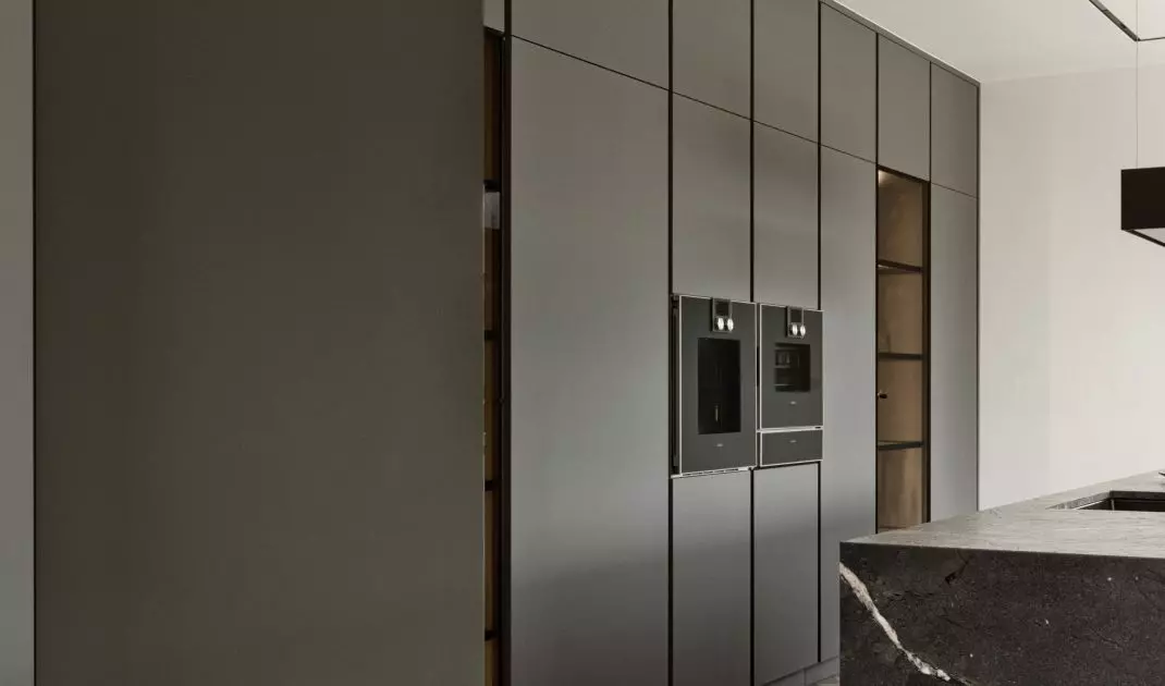 The door to the pantry has been hidden in the built-ins