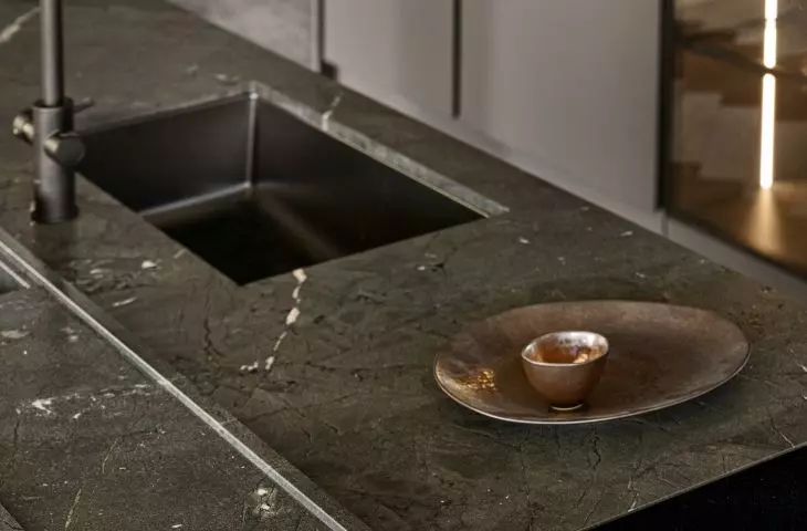 A special place for herbs has been created in the countertop