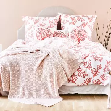 Peach-colored textiles are great for the bedroom
