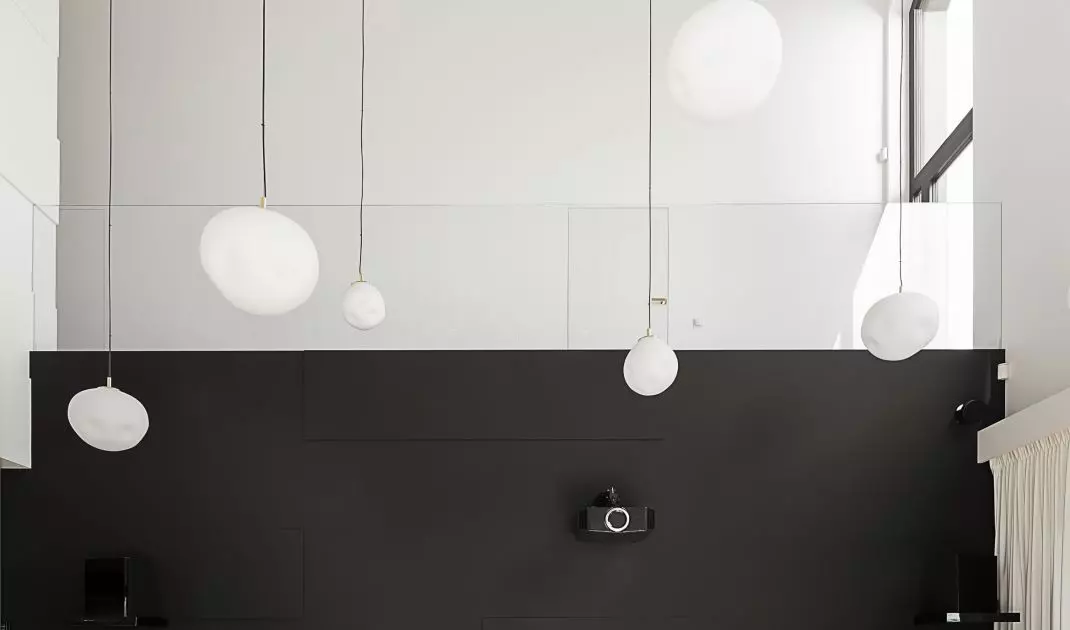 Free-hanging vertical ceiling tiles were used for the arrangement