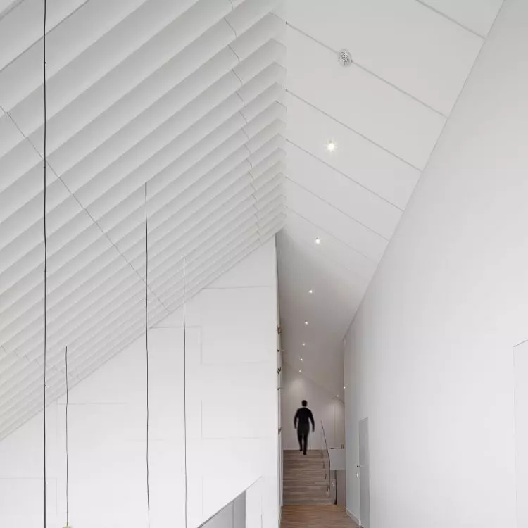 Ceiling system in corridor helped reduce reverberation