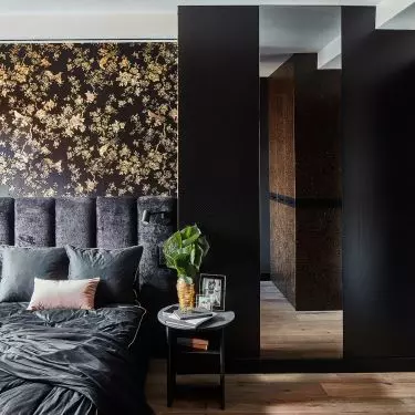 The bedroom was decorated with wallpaper