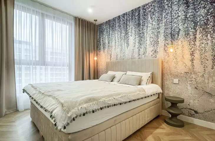The bedroom is part of an apartment located in Warsaw, Poland
