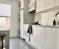 New York apartment, bright kitchen with terazzo floor