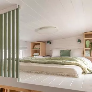 The bedroom was arranged on one of the mezzanine floors