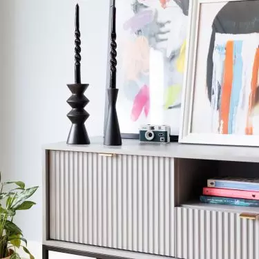 The RTV cabinet is decorated with fluted fronts