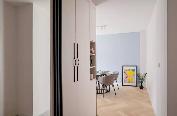 Capacious sofas in the hallway provide plenty of storage space