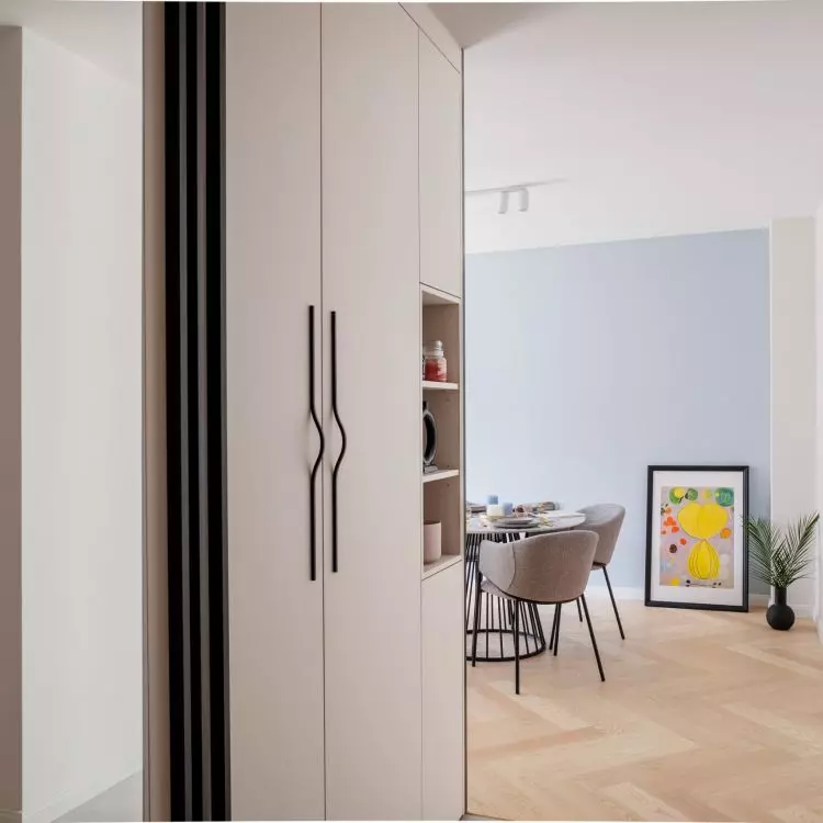 Capacious sofas in the hallway provide plenty of storage space