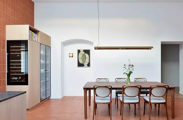 The kitchen is connected to the dining room