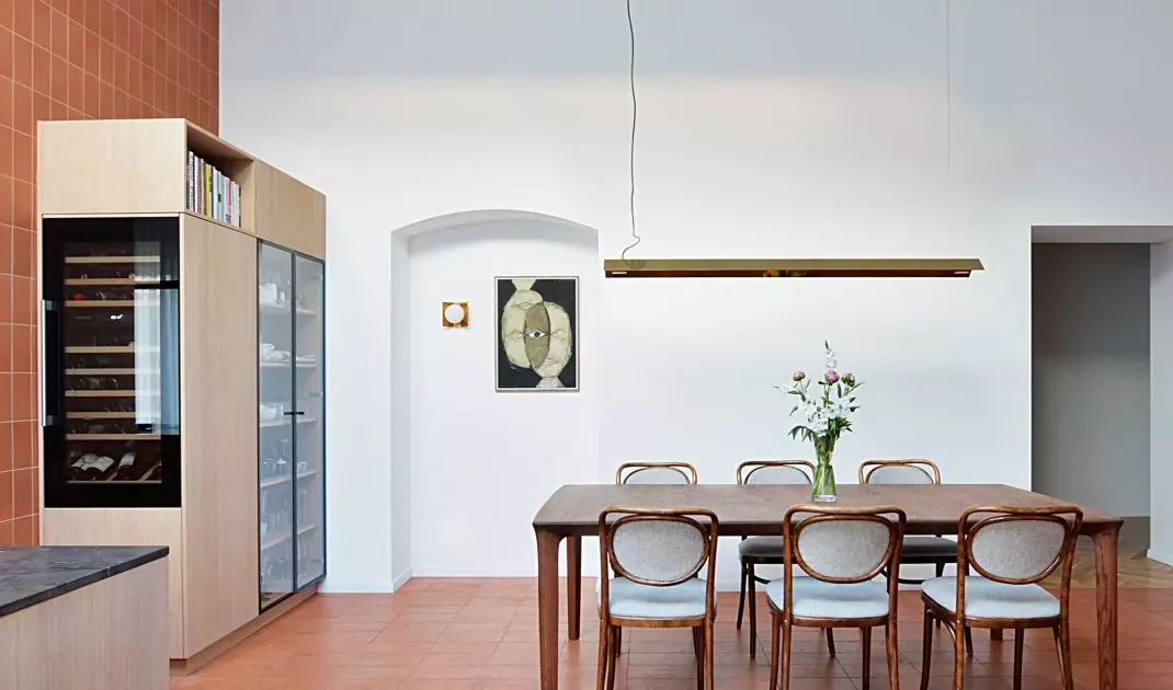 The kitchen is connected to the dining room