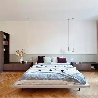 The bedroom is combined with a dressing room and a bathroom