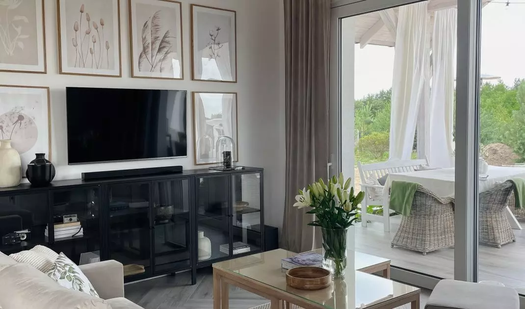 The TV screen is surrounded by images