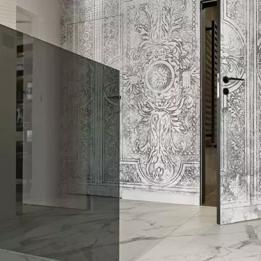 One of the walls in the hallway was covered with decorative wallpaper