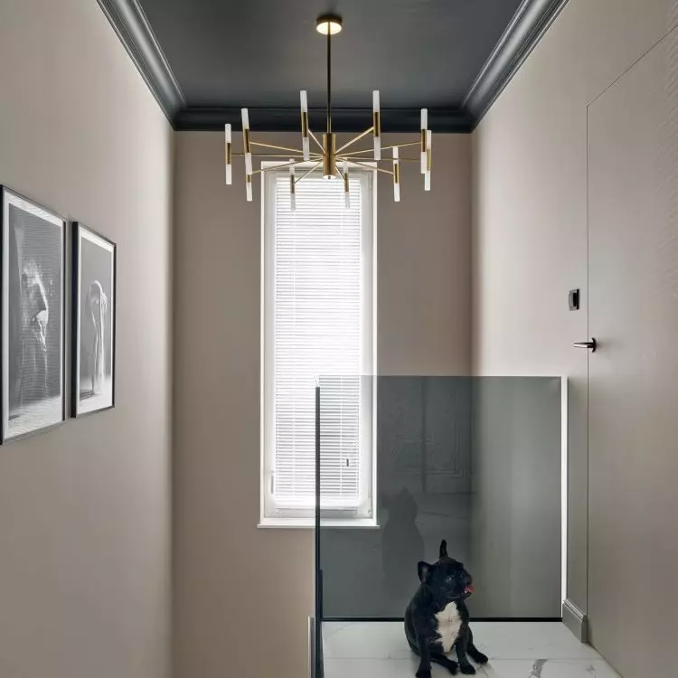 A simple glass balustrade adds a modern touch