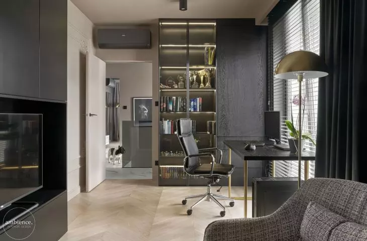 Massive black build-up contrasts with white wall