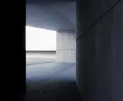 The path leads to the main part of the facility