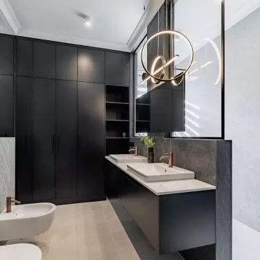 The capacious built-ins were designed by Aleksandra Przychodzka of Deer Wood Carpentry Studio.
