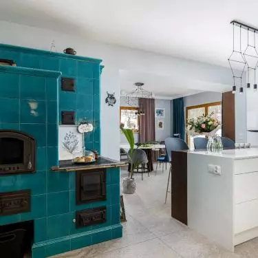 In the kitchen there is an azure stove