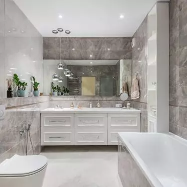 If you decide to build up the entire wall at the height of the rack, you will get a shelf with a width of about 20 cm. This is the perfect place for bathroom accessories or decorations! 