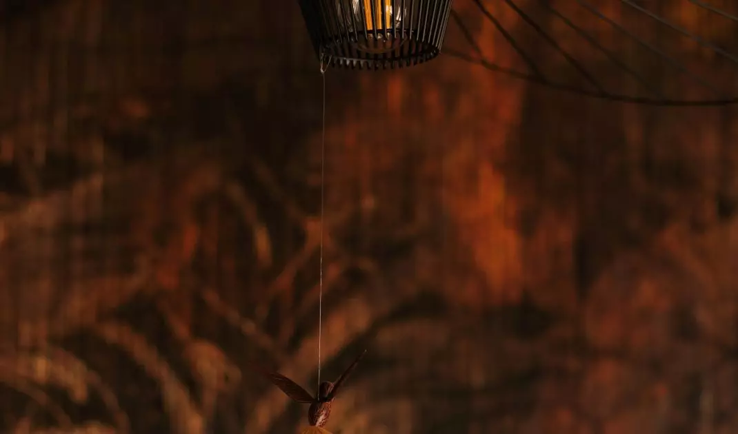 The hat-shaped lamp is complemented by a souvenir from the trip
