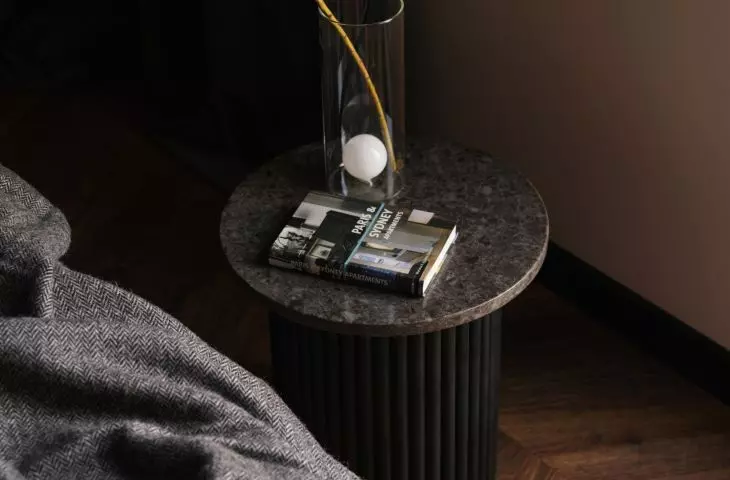 Tables with a fluted base were designed by Magdalena Wojtyczka