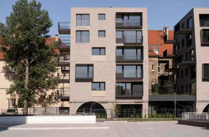 Multi-family residential building with service function on the first floor, Poznań