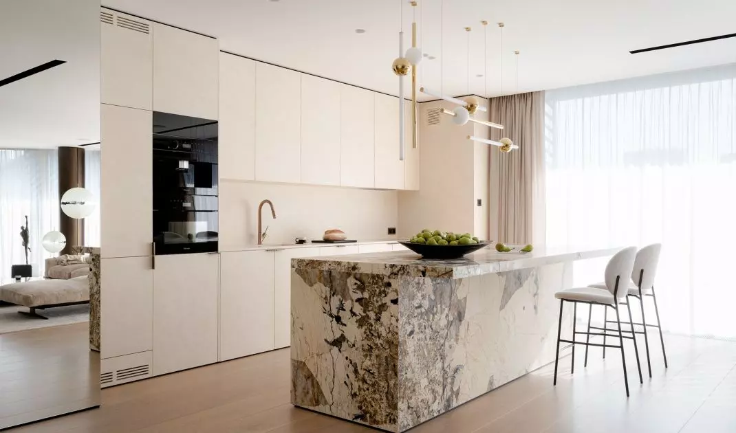 The kitchen island was covered with Brazilian quartzite