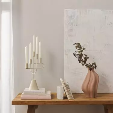 Peach vase is a simple but striking accessory
