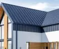 Flamingo iQ gutter system in combination with Iron Click roof panel