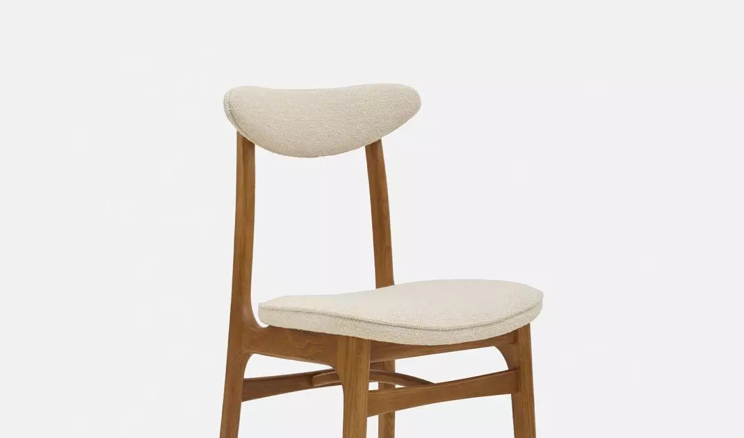 The chair became famous for its distinctive crescent-shaped backrest