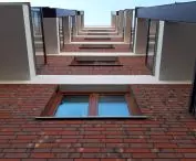 Przykład wykorzystania elastycznych płytek elewacyjncyh w systemie IZOFLEX (6124 BELGIUM)
