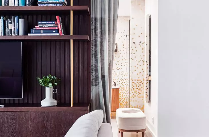 The same mosaic appears in the bathroom and on the structural column