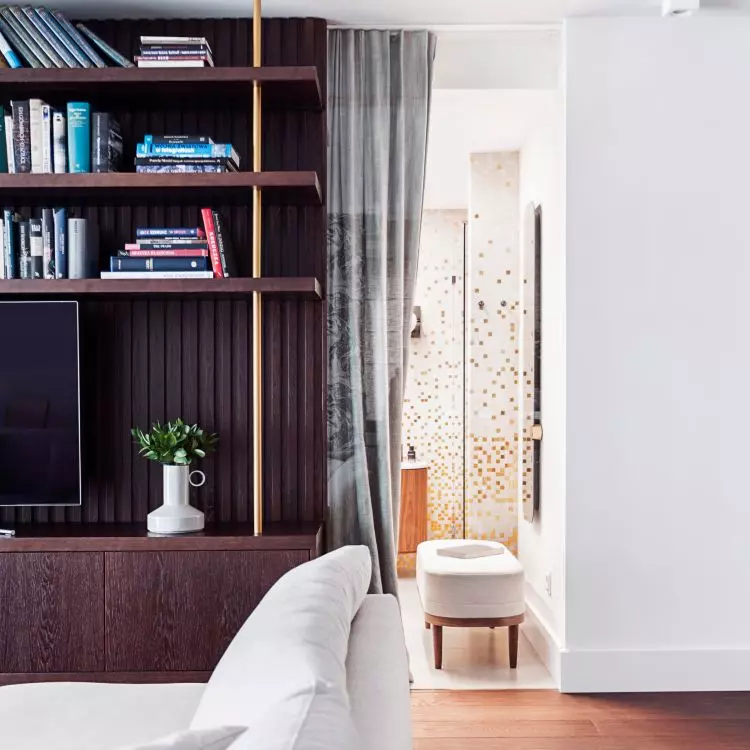 The same mosaic appears in the bathroom and on the structural column