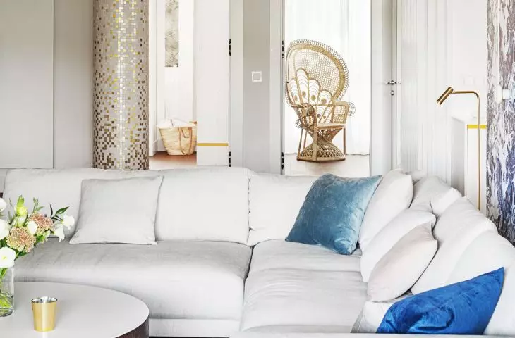 In the living room there is a comfortable corner sofa, which is a place to watch movies