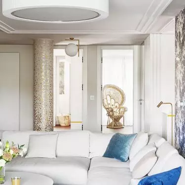 In the living room there is a comfortable corner sofa, which is a place to watch movies