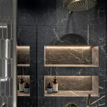 Illuminated shelves for cosmetics are a practical and stylish solution
