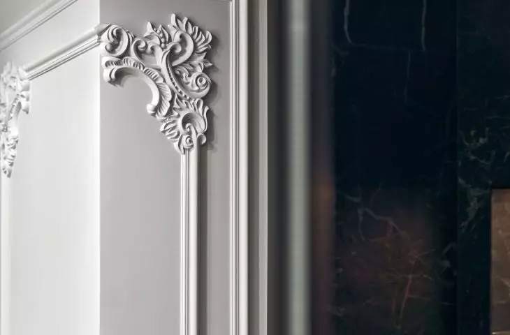 Stucco appears throughout the home