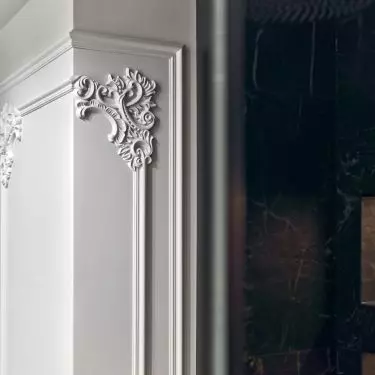 Stucco appears throughout the home